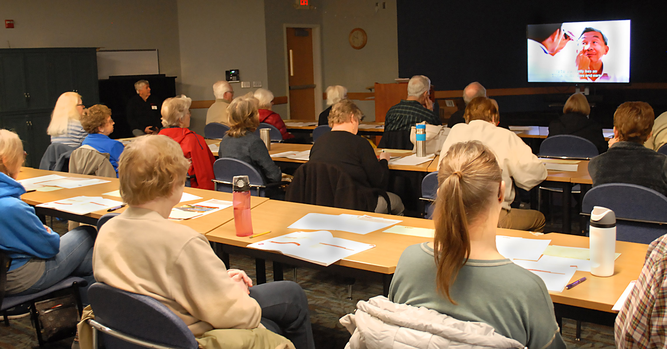 Men and women in AARP driving class 2025