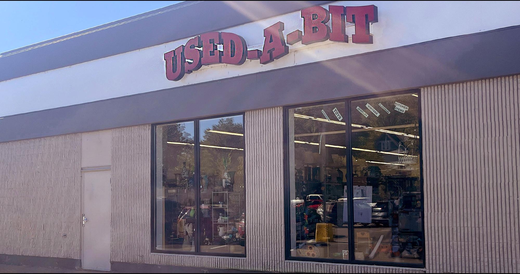 Front windows at Used-a-Bit Shoppe
